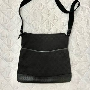 Gucci GG Canvas Perforated Leather Messenger bag
